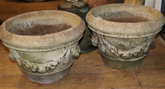 A pair of reconstituted stone garden planters W.50cm